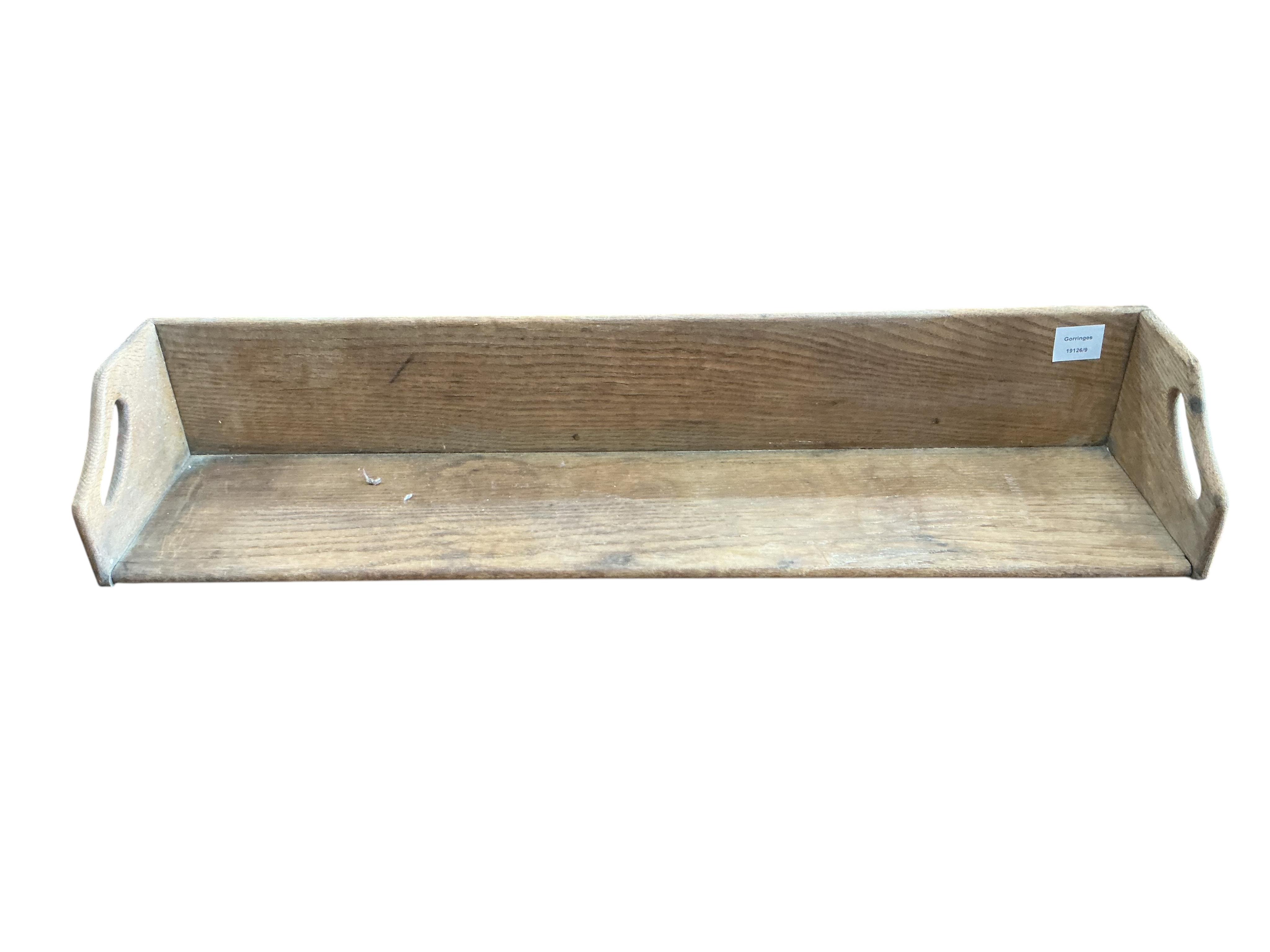 A pair of oak book troughs, width 86cm, depth 20cm, height 15cm
